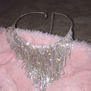 Silver diamond necklace.